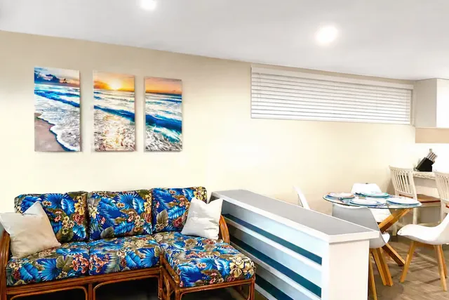 a living room that has a couch and a table in it