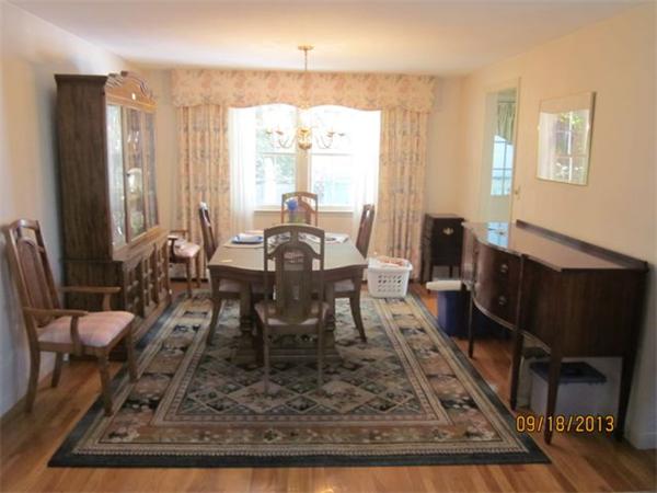 12 Quadrant Road Salem, MA 01970 - Photo 2 of 9 a view of a dining room with furniture window and wooden floor