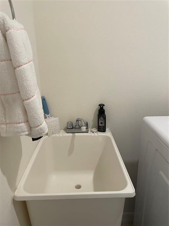 6209 Southwest 89th St Road Ocala, FL 34476 - Photo 17 of 27 a bathroom with a sink and toilet