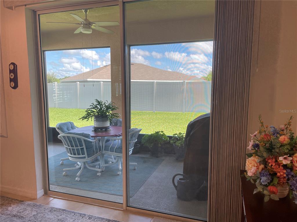 6209 Southwest 89th St Road Ocala, FL 34476 - Photo 25 of 27 a dining room with furniture and window