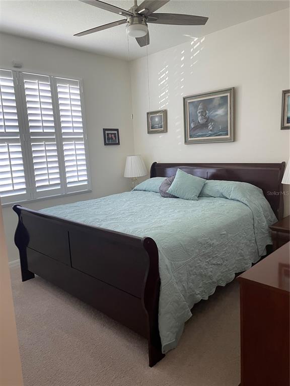 6209 Southwest 89th St Road Ocala, FL 34476 - Photo 3 of 27 a bedroom with a bed and window