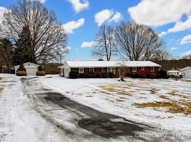 a view of road with a snow on the road