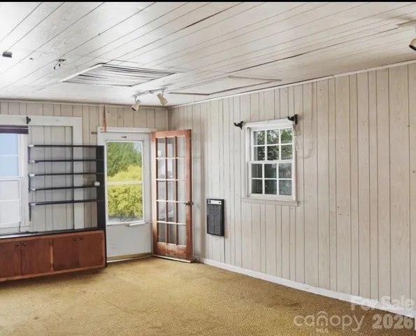 an empty room with windows