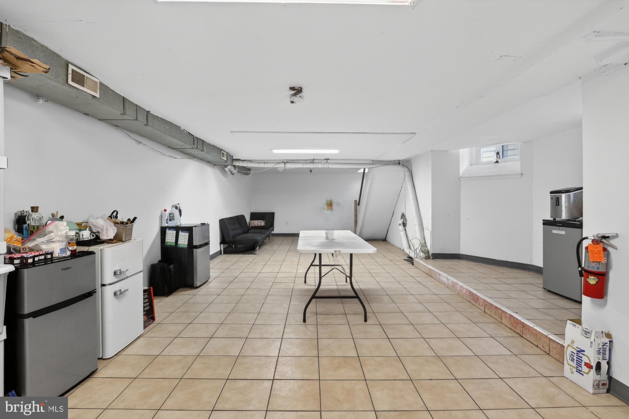 4001 Baltimore Avenue Philadelphia, PA 19104 - Photo 11 of 40 a living room with furniture and a wooden floor