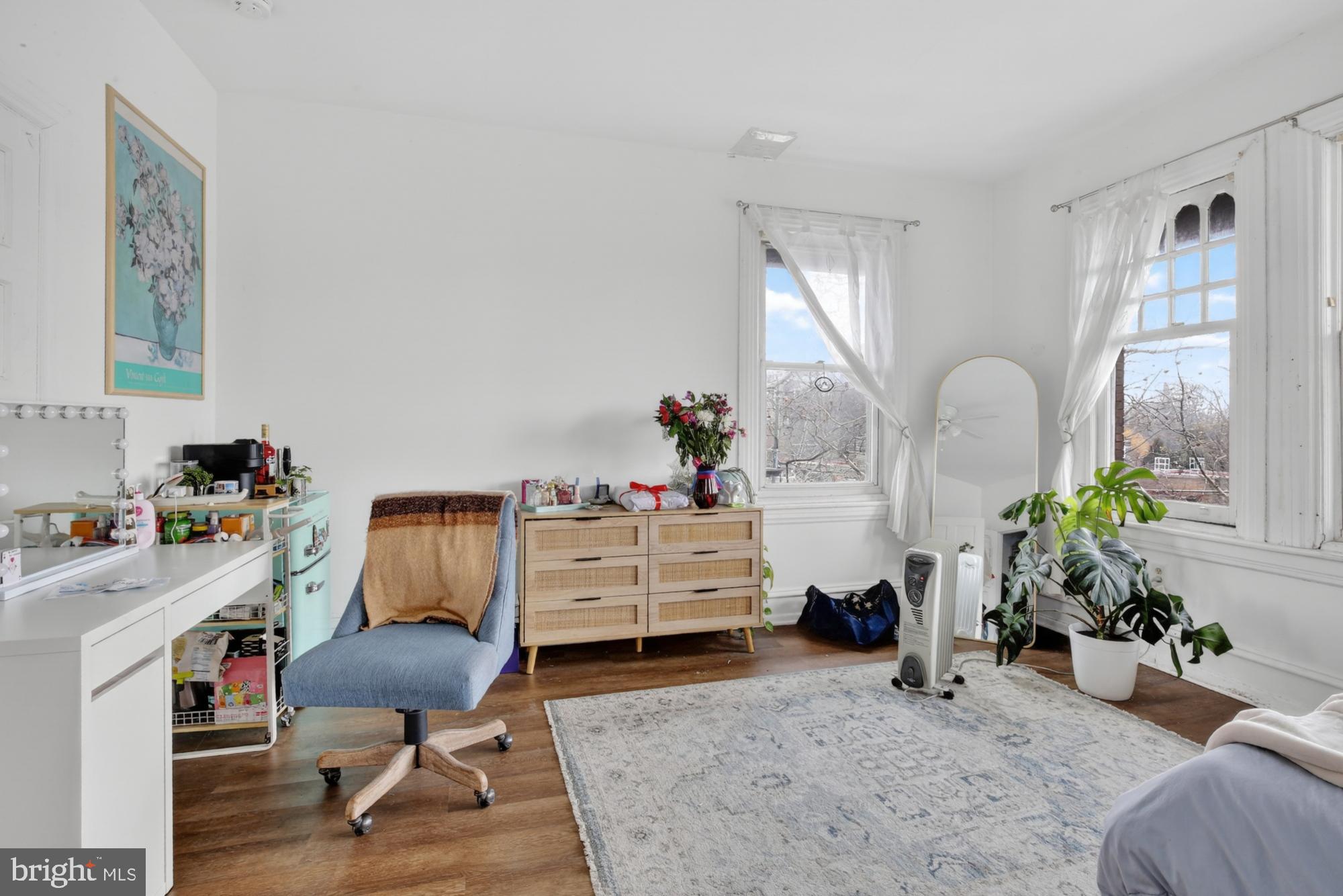 4001 Baltimore Avenue Philadelphia, PA 19104 - Photo 25 of 40 a bed room with furniture and a chandelier