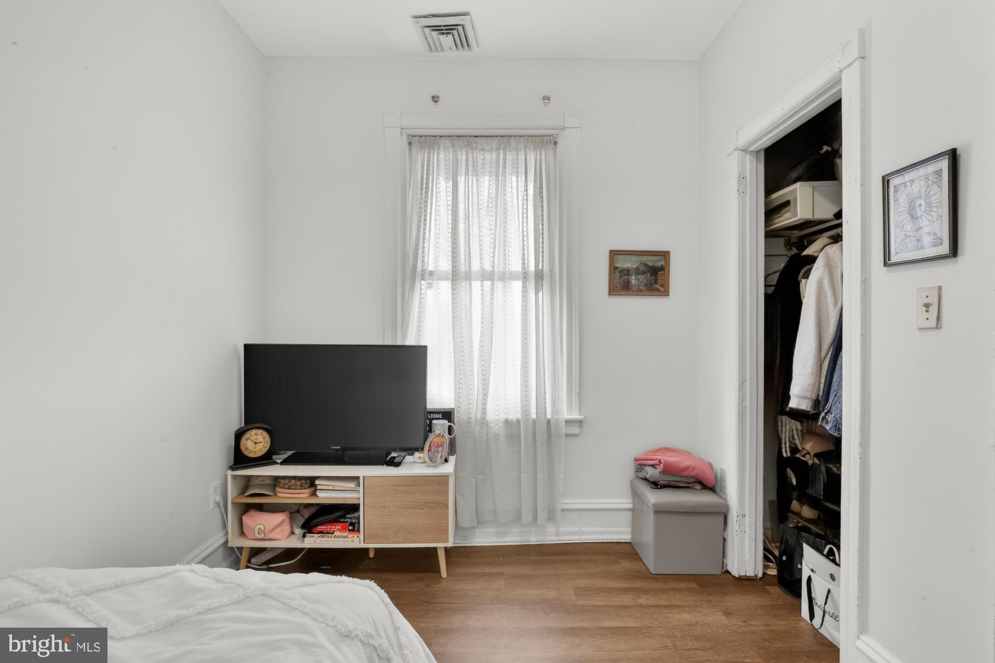 4001 Baltimore Avenue Philadelphia, PA 19104 - Photo 30 of 40 a bedroom with a bed and a flat screen tv