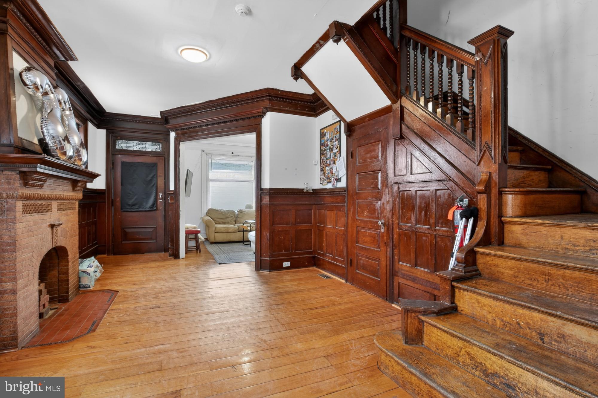 4001 Baltimore Avenue Philadelphia, PA 19104 - Photo 3 of 40 a view of livingroom with furniture and a fireplace