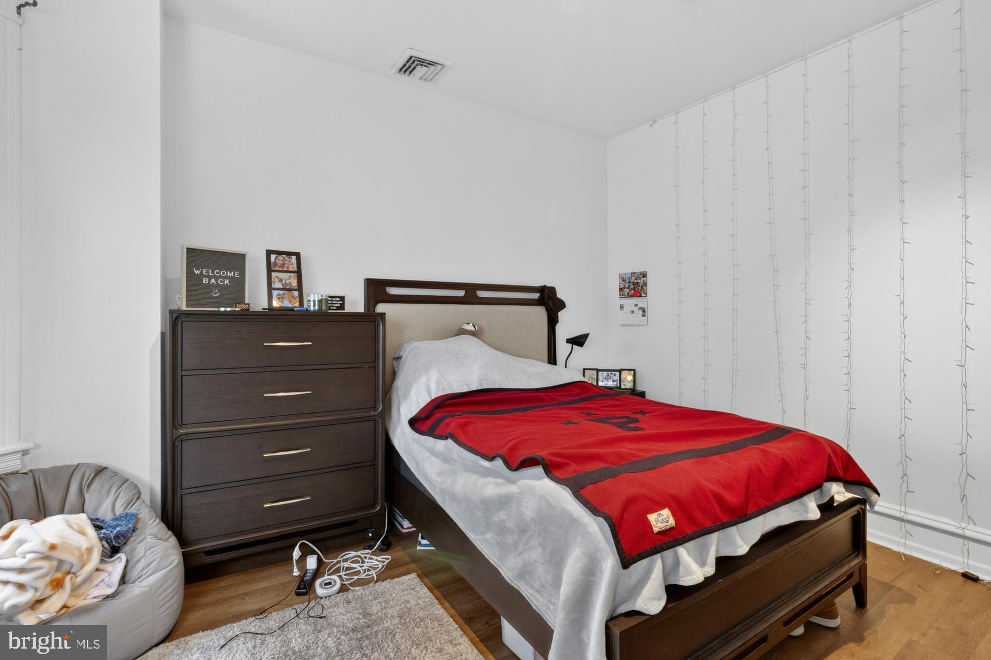 4001 Baltimore Avenue Philadelphia, PA 19104 - Photo 34 of 40 a bedroom with a bed and a dresser