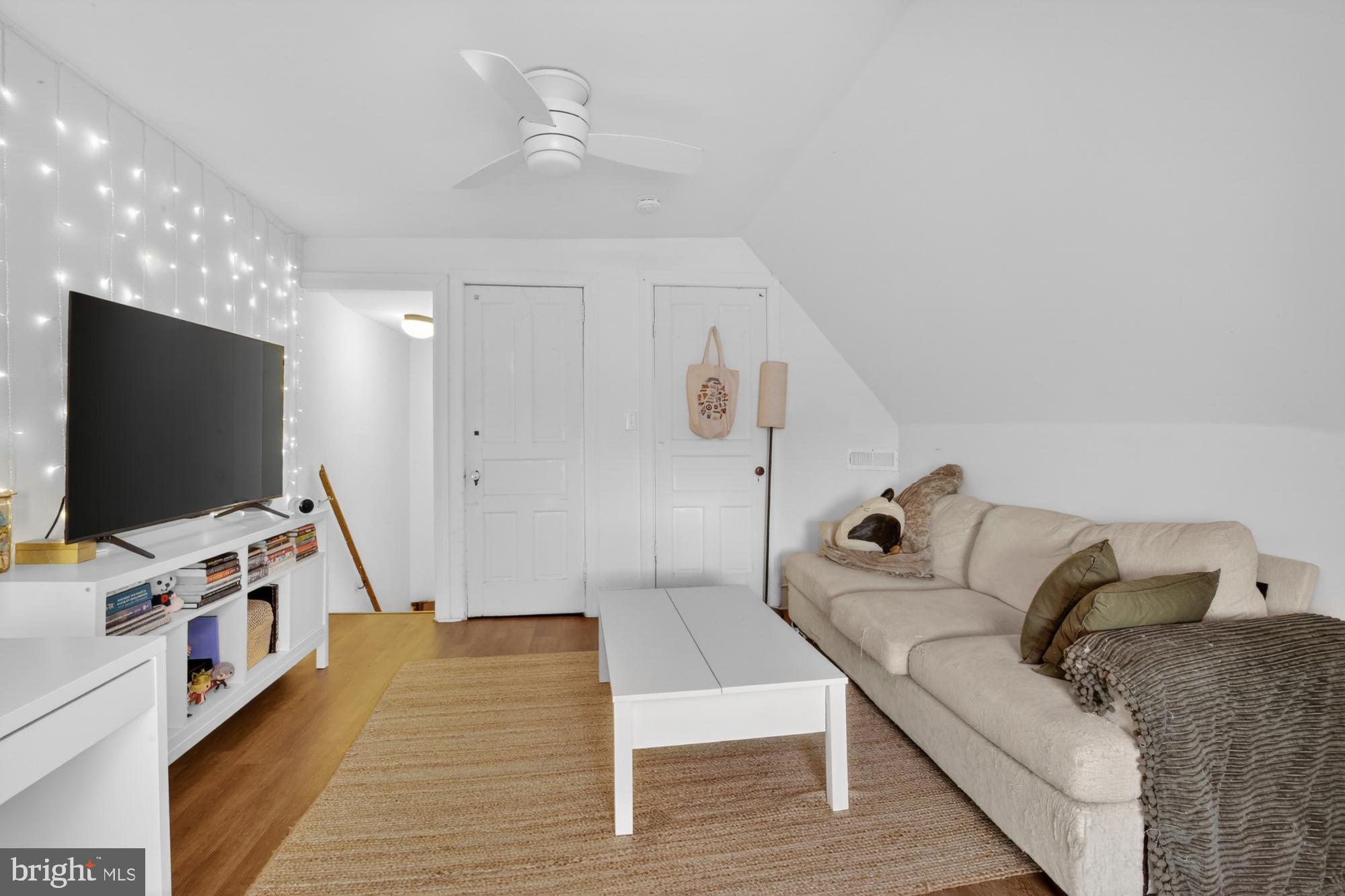 4001 Baltimore Avenue Philadelphia, PA 19104 - Photo 36 of 40 a living room with furniture and a flat screen tv