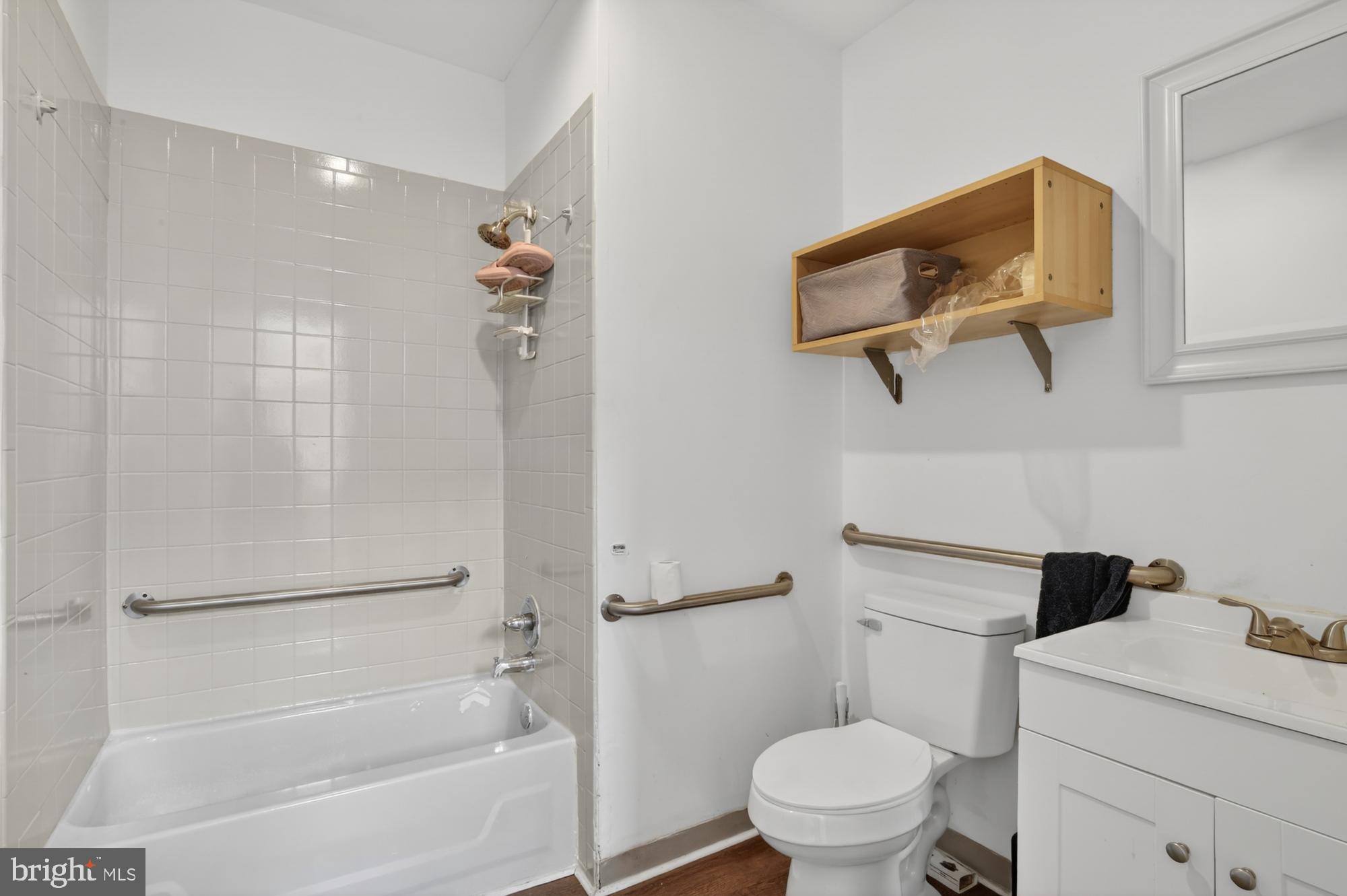 4001 Baltimore Avenue Philadelphia, PA 19104 - Photo 8 of 40 a bathroom with a toilet and a shower