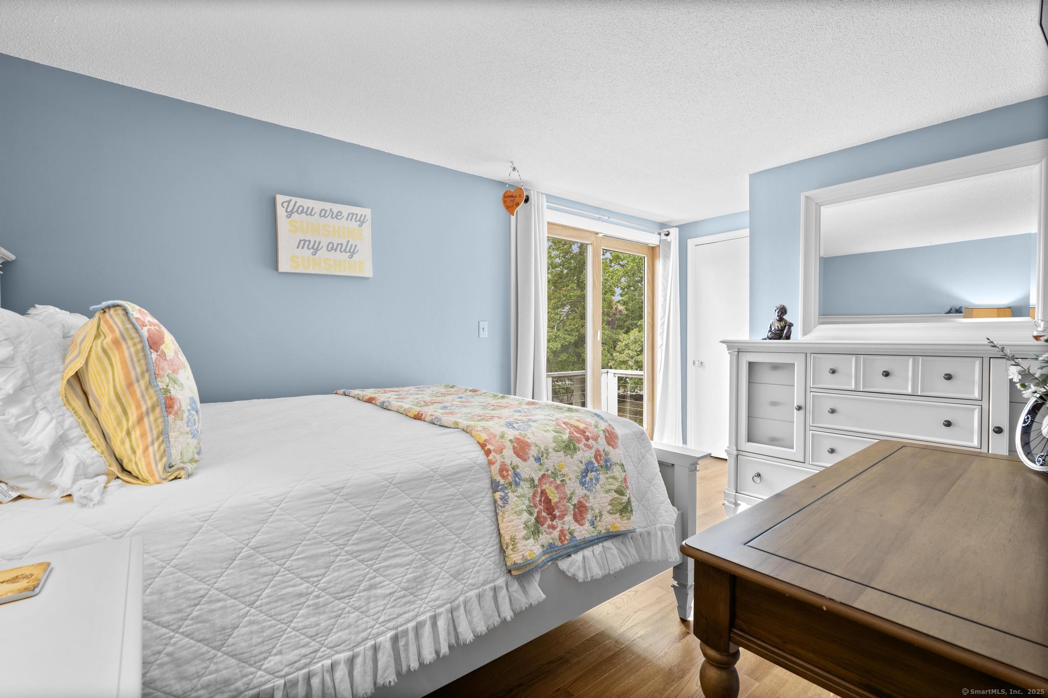 94 Summer Island Road Branford, CT 06405 - Photo 25 of 40 a bedroom with a bed and window