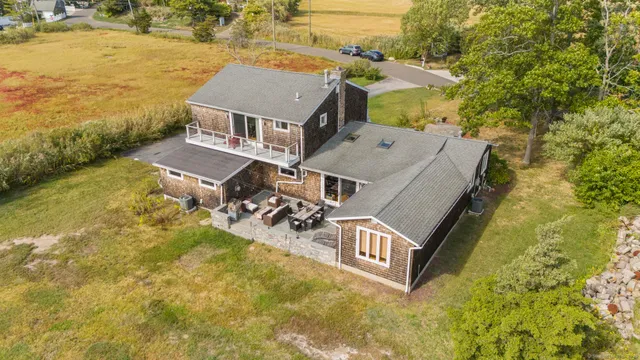 an aerial view of houses with outdoor space