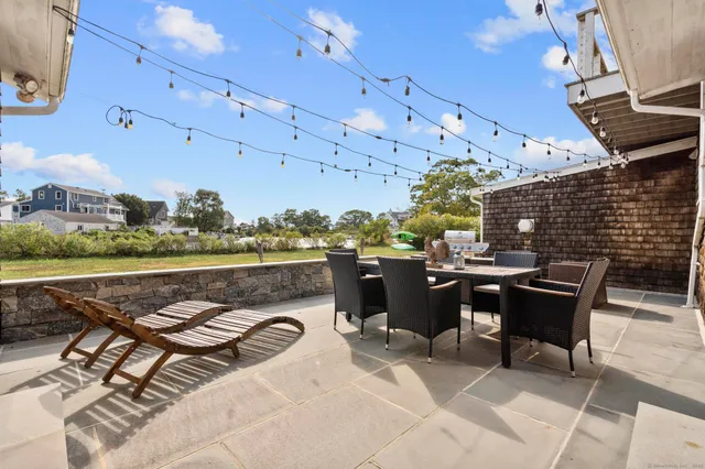 a outdoor space with lots of table and chairs