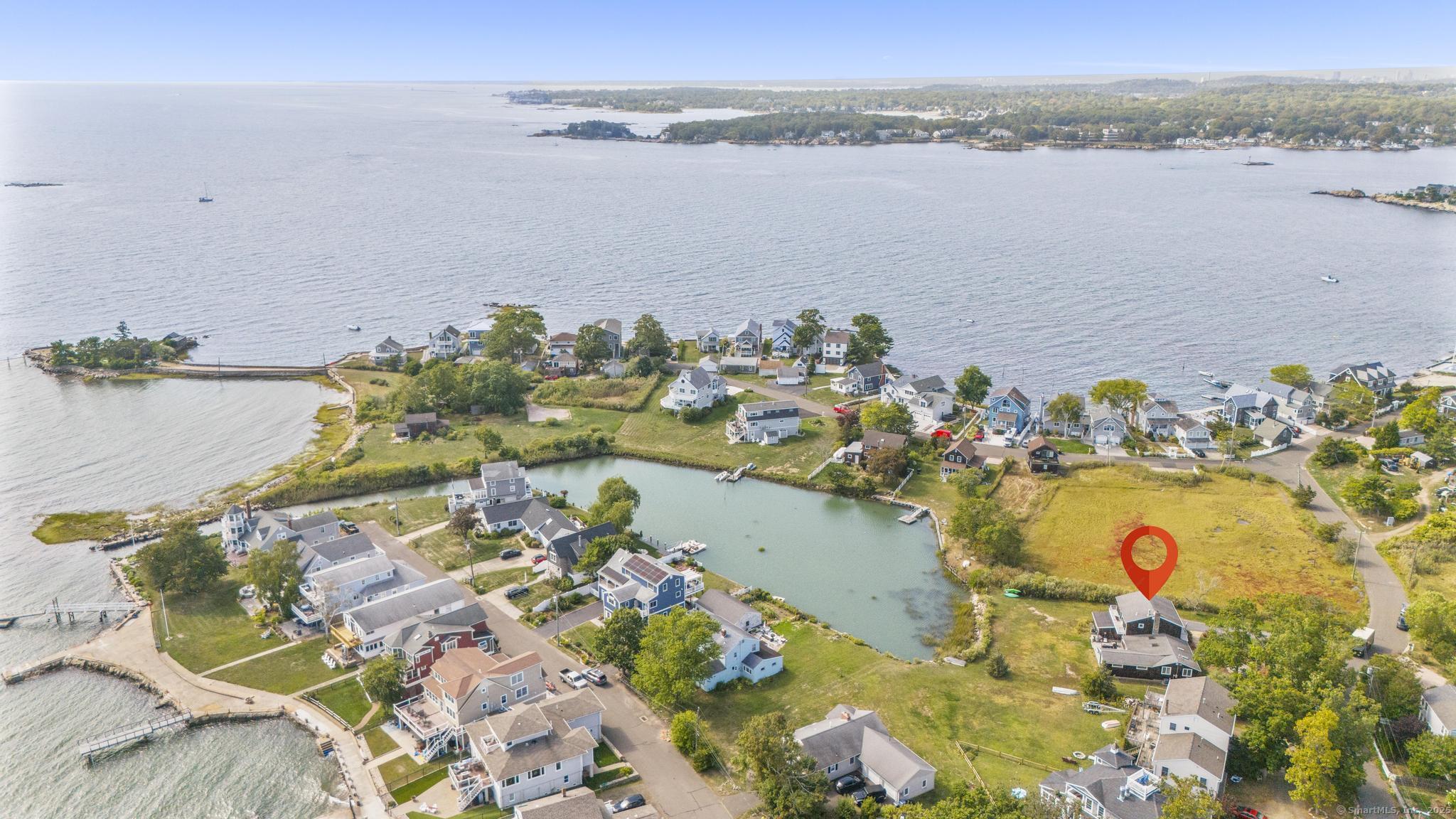 94 Summer Island Road Branford, CT 06405 - Photo 36 of 40 an aerial view of a houses with a lake view