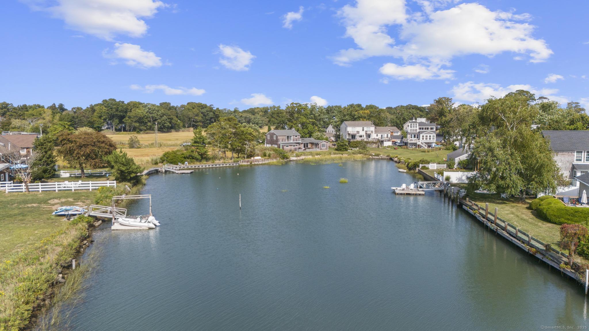 94 Summer Island Road Branford, CT 06405 - Photo 39 of 40 a view of a lake with houses
