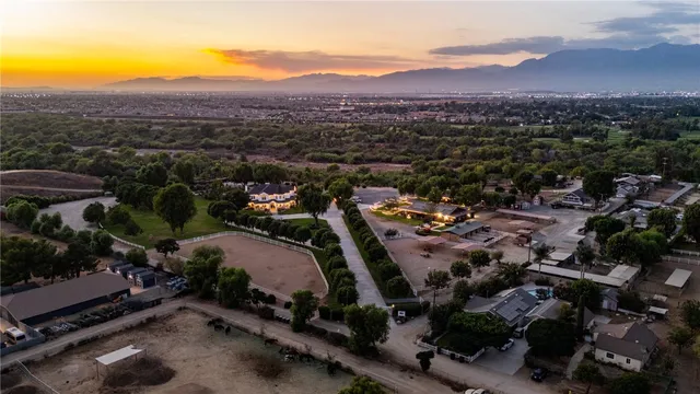 an aerial view of residential houses and outdoor space