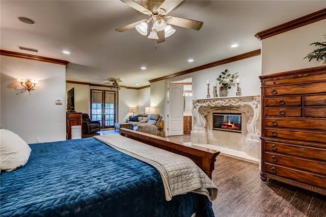 a bed room with a bed and a fireplace