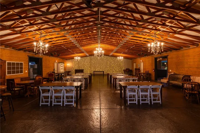 a outdoor space with lots of tables and chairs