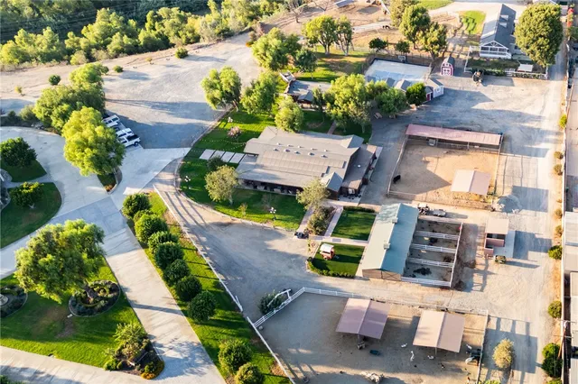 an aerial view of a house with a garden