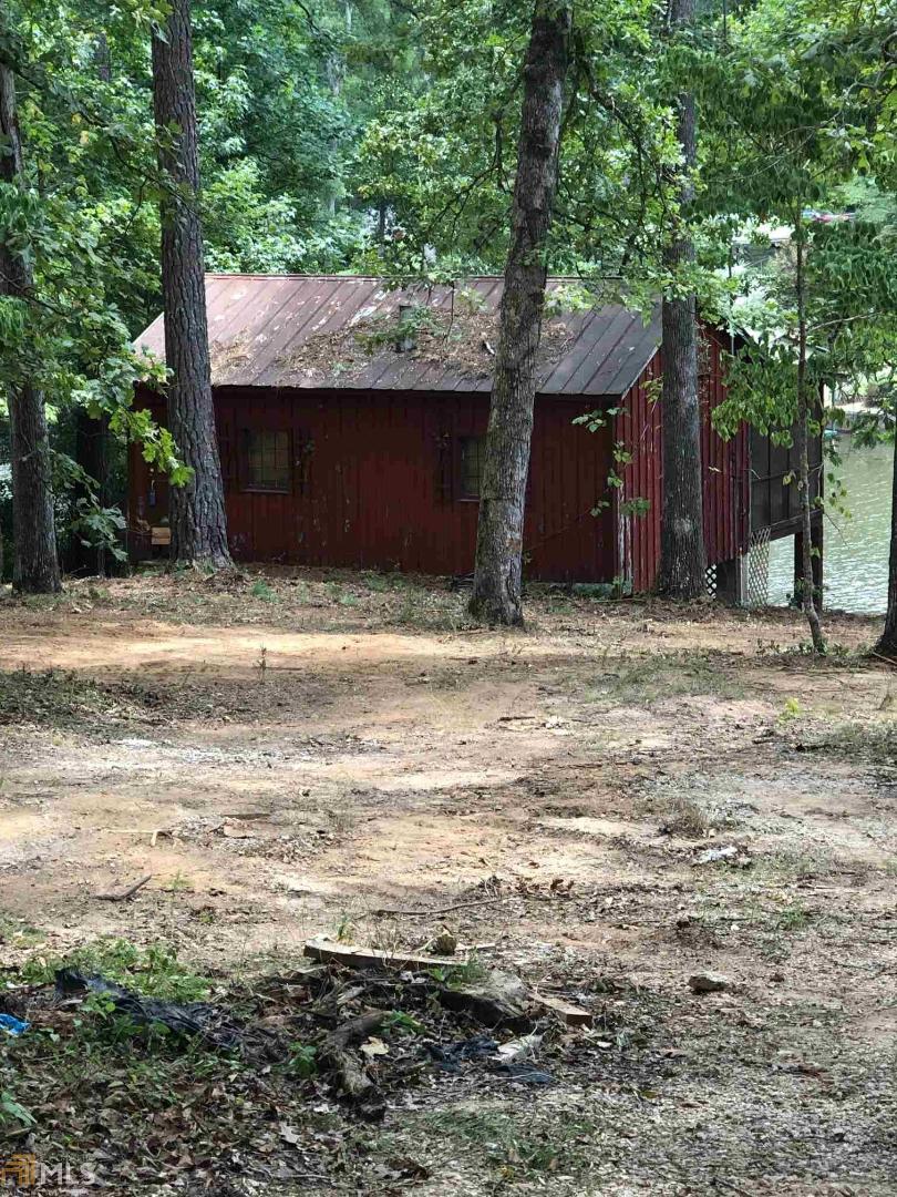 352 Haley Road Jackson, GA 30233 - Photo 1 of 1 a house with a tree in front of it