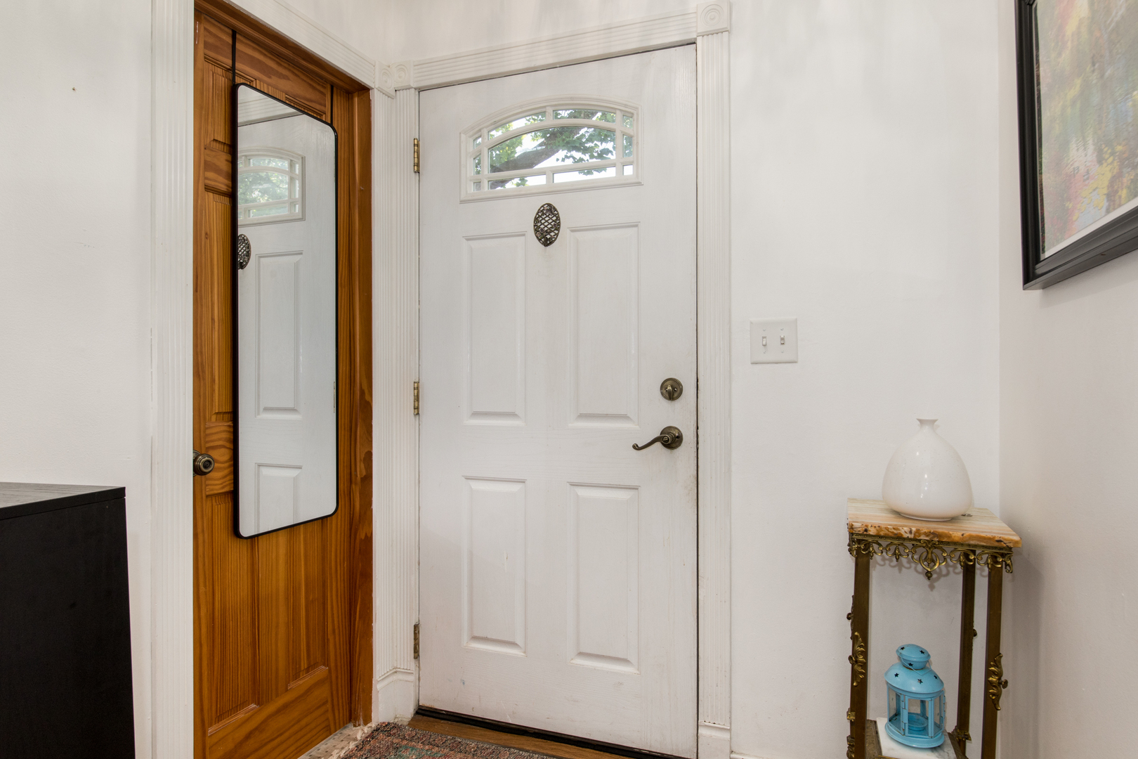 817 Hibbard Road, Unit D Wilmette, IL 60091 - Photo 11 of 26 a view of entryway with wooden floor