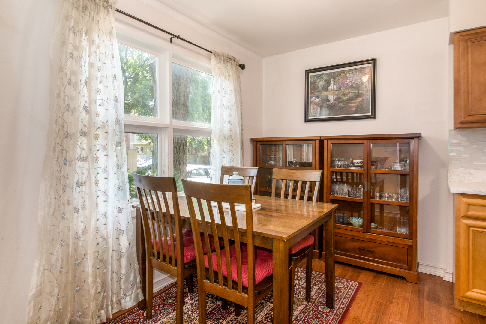 817 Hibbard Road, Unit D Wilmette, IL 60091 - Photo 13 of 26 a view of a wooden chairs in a room