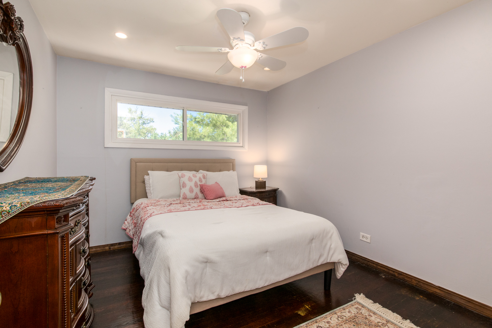 817 Hibbard Road, Unit D Wilmette, IL 60091 - Photo 21 of 26 a bedroom with a bed and a with a window