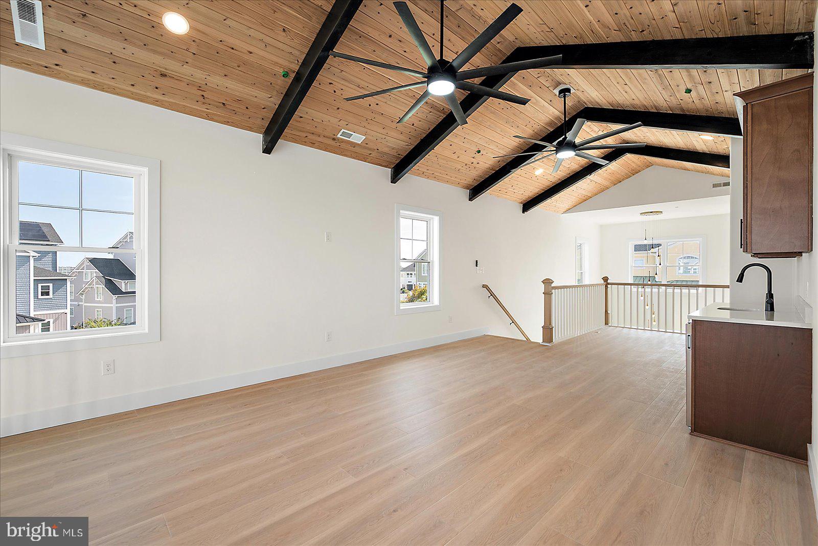 12971 Inlet Isle Lane Ocean City, MD 21842 - Photo 45 of 134 2nd family Room with tall ceilings