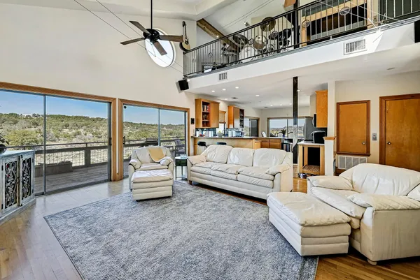 a living room with furniture or outdoor view and a large window