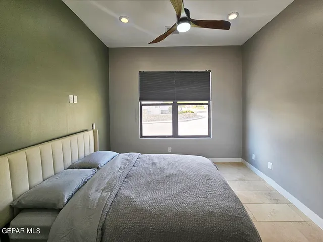 a view of a bedroom from a hallway