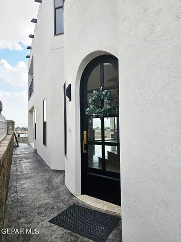 a view of a livingroom with furniture and a chandelier