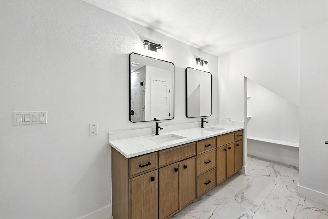 815 Buckingham Place Austin, TX 78745 - Photo 17 of 33 a bathroom with 2 sink tub and a mirror