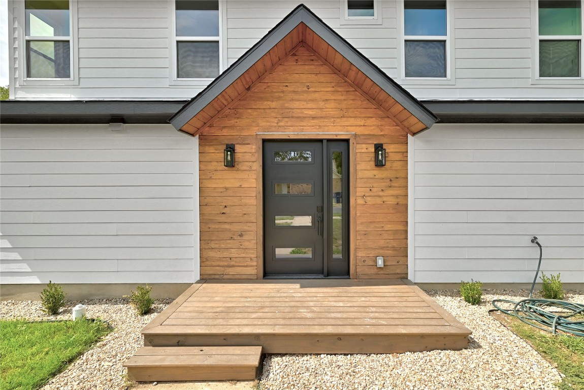 815 Buckingham Place Austin, TX 78745 - Photo 3 of 33 a view of outdoor space and a garage