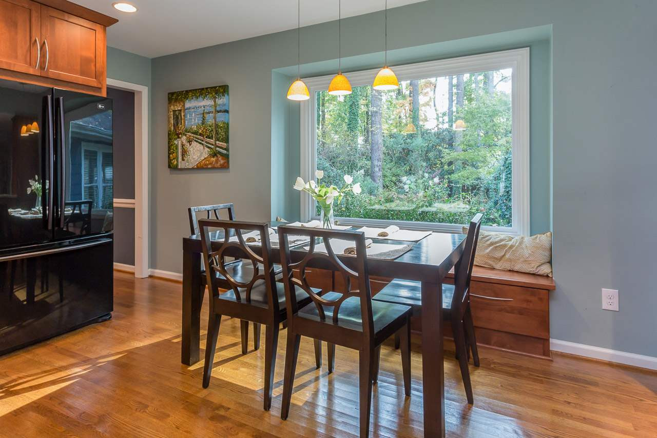 7608 Harps Mill Road Raleigh, NC 27615 - Photo 9 of 25 The breakfast room window overlooks the big backyard. A built in window seat provides casual seating as well as storage underneath. Bay Window in Breakfast Room