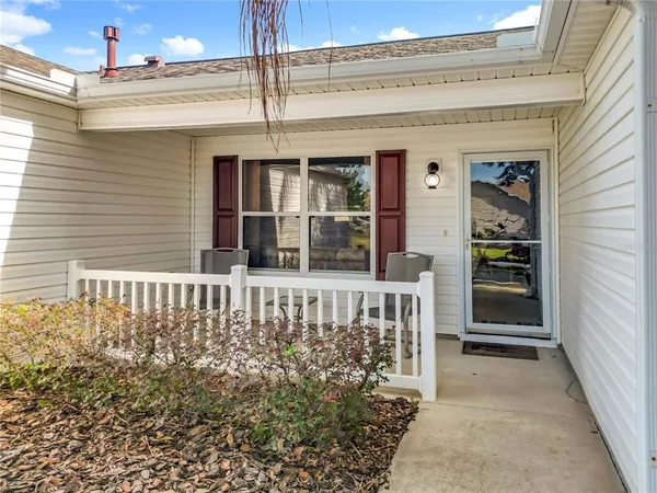 a view of a house with a porch