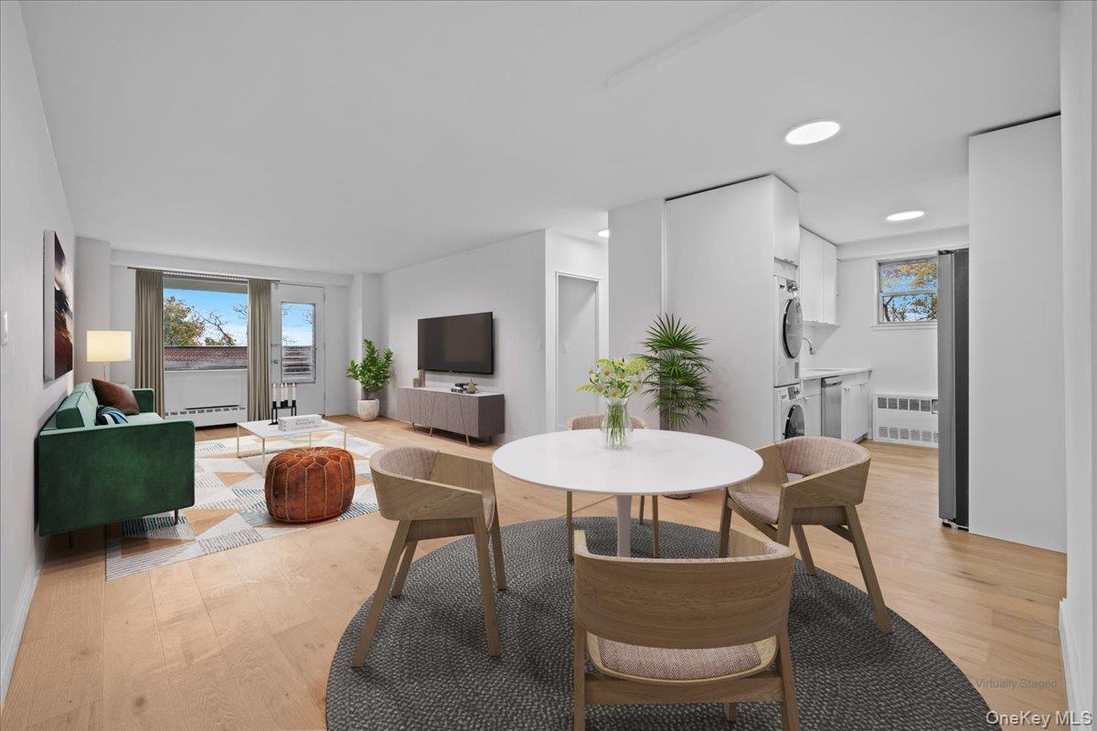 5700 Arlington Avenue, Unit 1C Bronx, NY 10471 - Photo 4 of 18 a view of a livingroom with furniture and a potted plant