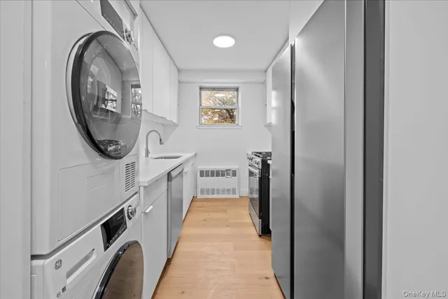 a bathroom with a bathtub and a mirror