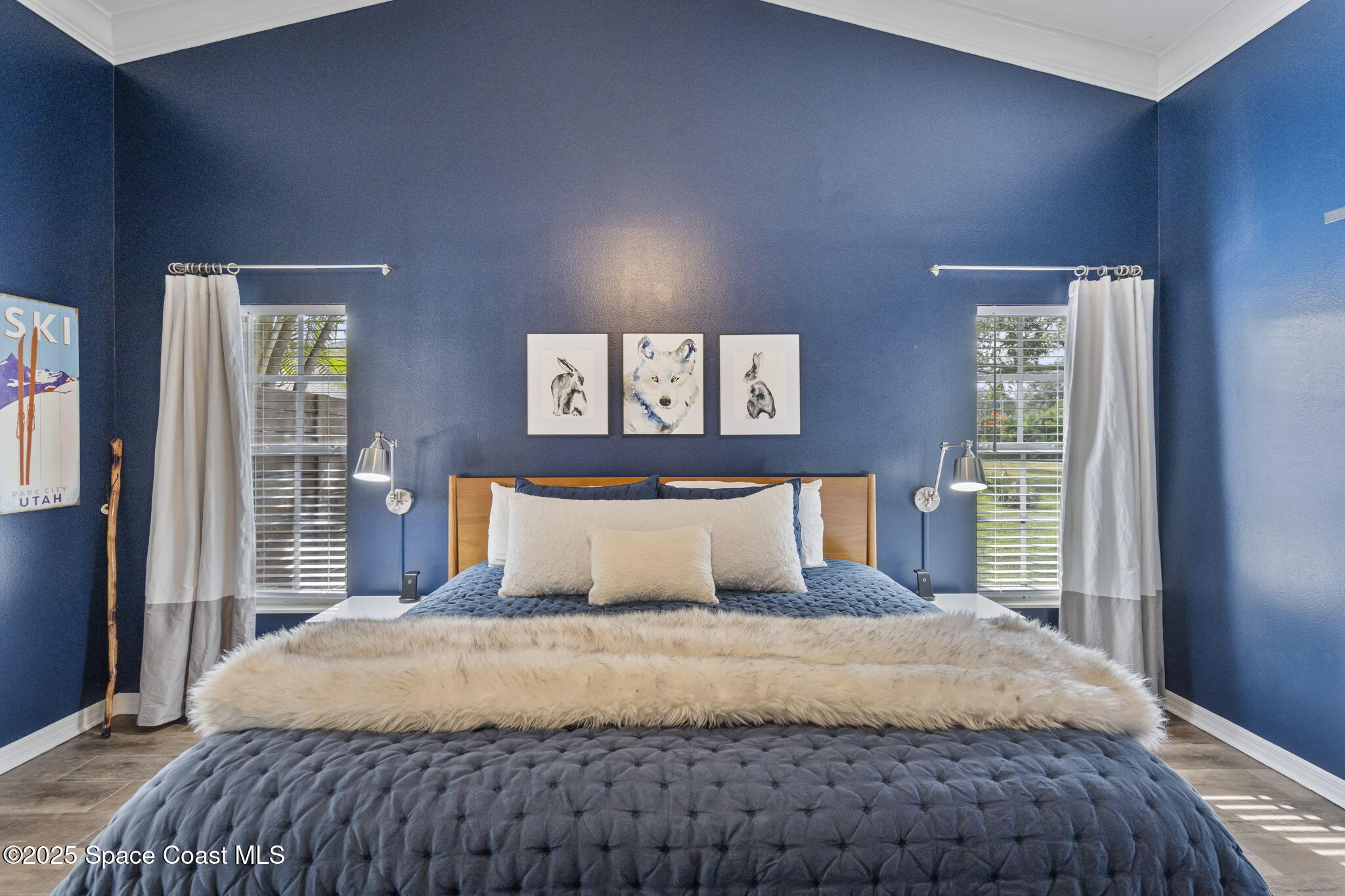 4089 Mallard Drive Melbourne, FL 32934 - Photo 12 of 53 a bedroom with a large bed and a window