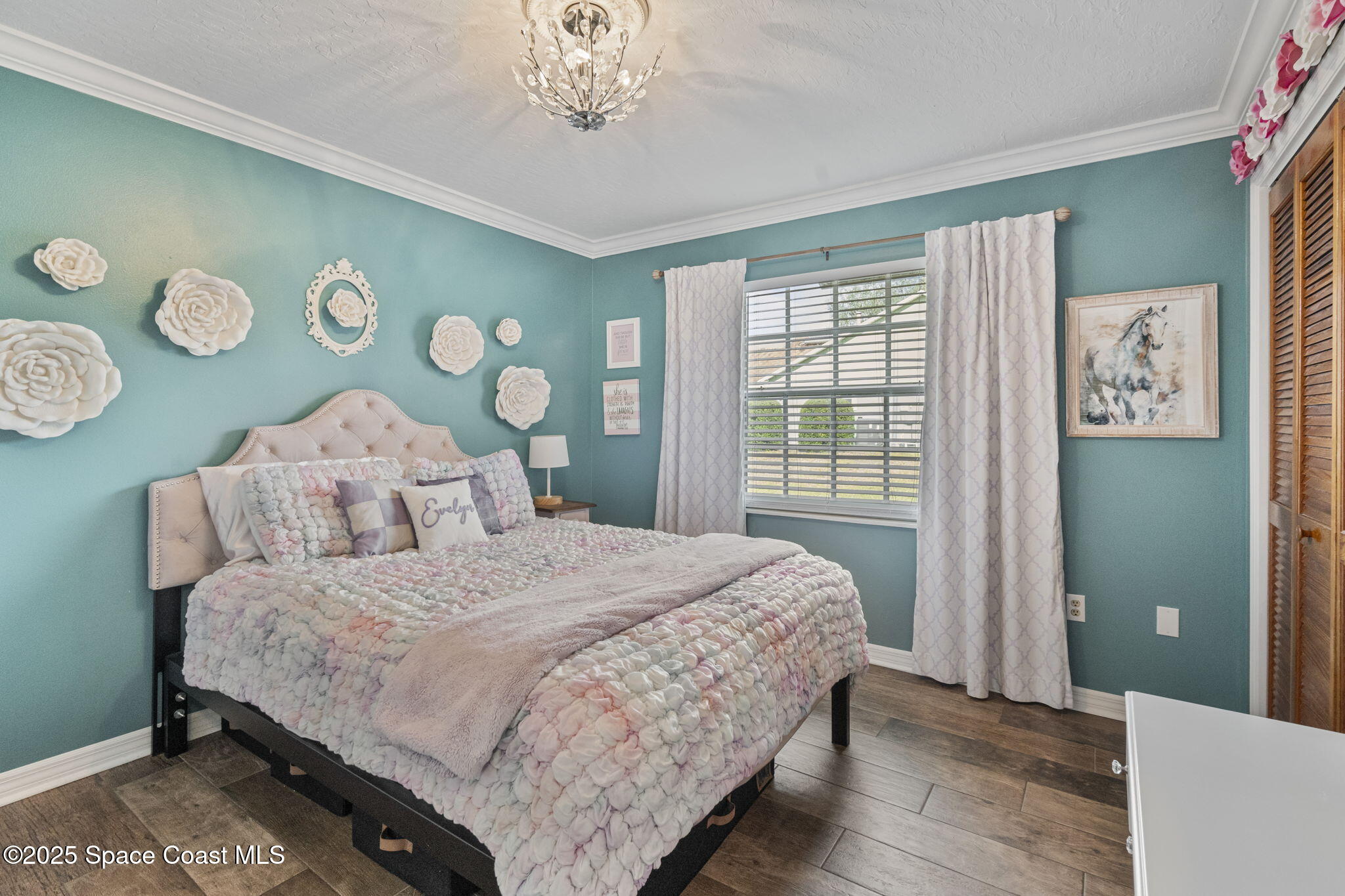 4089 Mallard Drive Melbourne, FL 32934 - Photo 29 of 53 a bedroom with a bed and a window