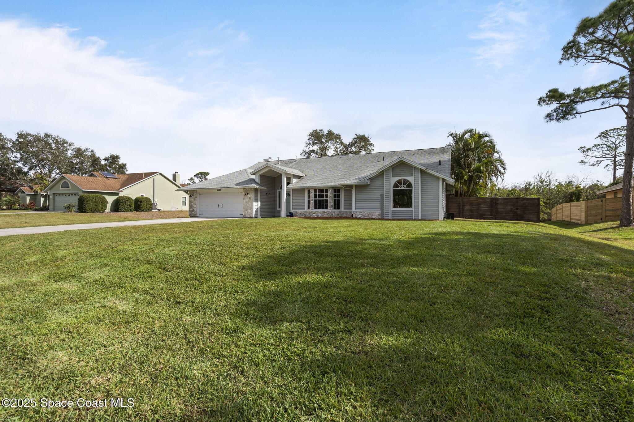 4089 Mallard Drive Melbourne, FL 32934 - Photo 3 of 53 a house view with garden space