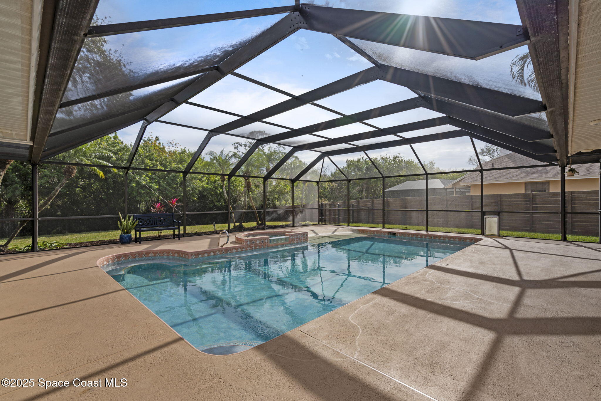 4089 Mallard Drive Melbourne, FL 32934 - Photo 38 of 53 a view of a swimming pool with a yard