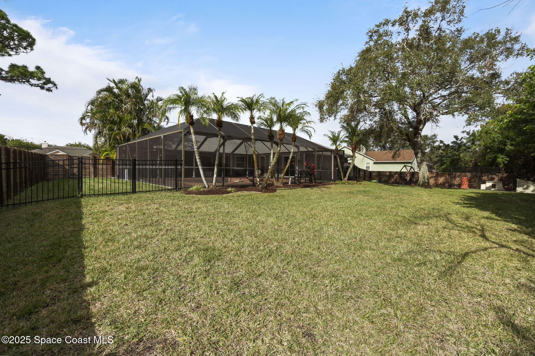 4089 Mallard Drive Melbourne, FL 32934 - Photo 39 of 53 a view of a house with a yard