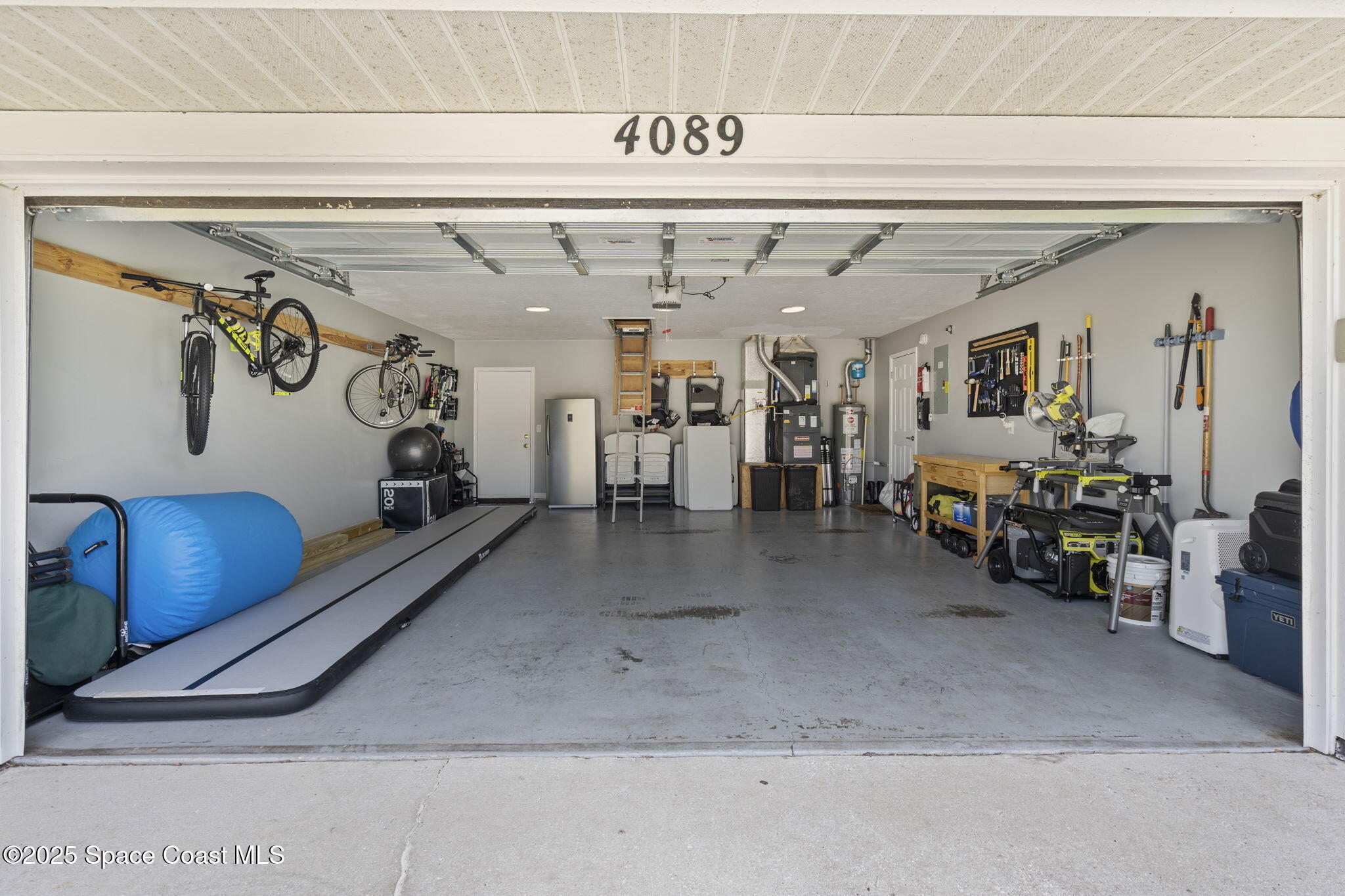 4089 Mallard Drive Melbourne, FL 32934 - Photo 42 of 53 a view of a garage with chairs