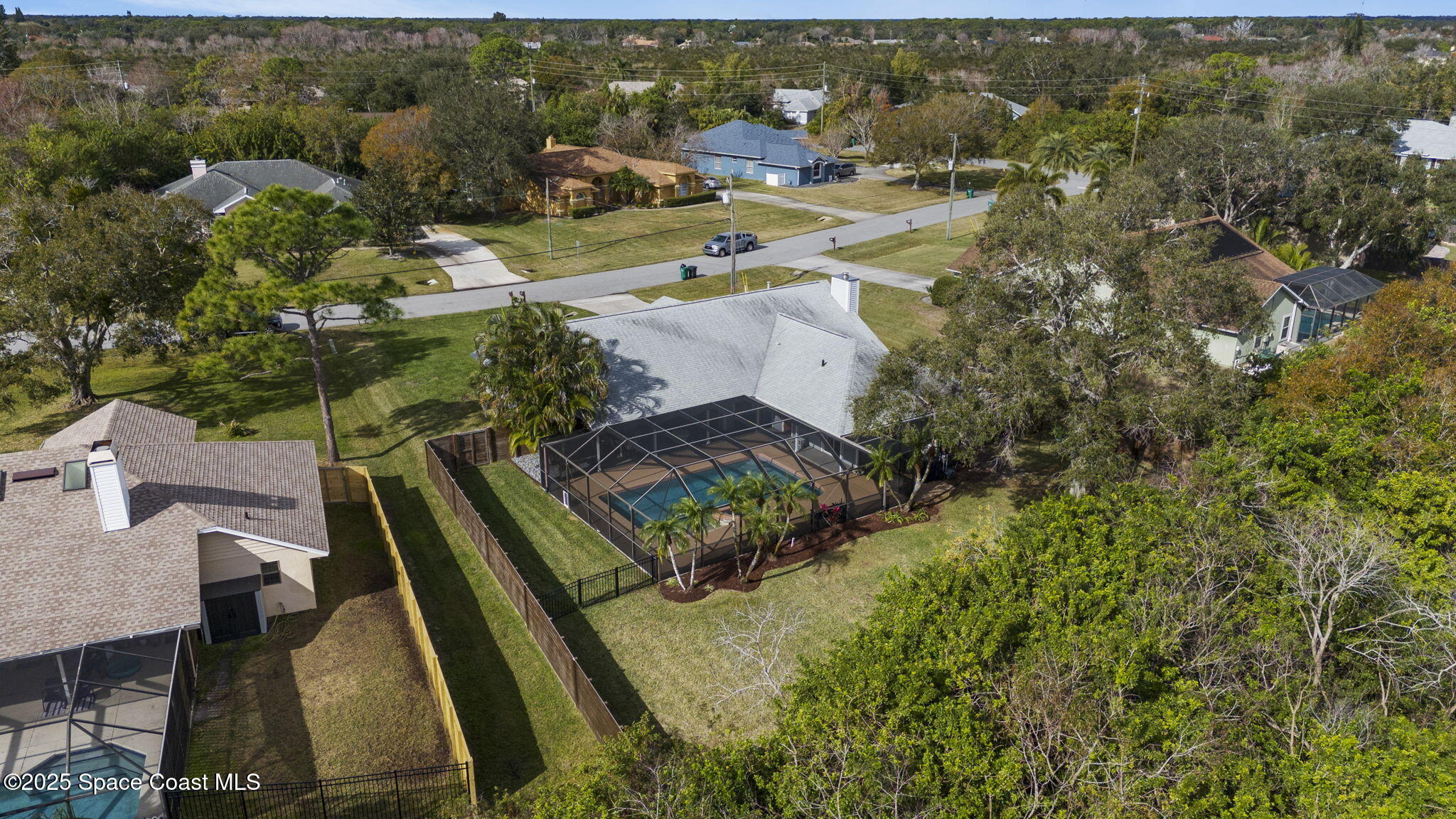 4089 Mallard Drive Melbourne, FL 32934 - Photo 45 of 53 an aerial view of a house with a yard