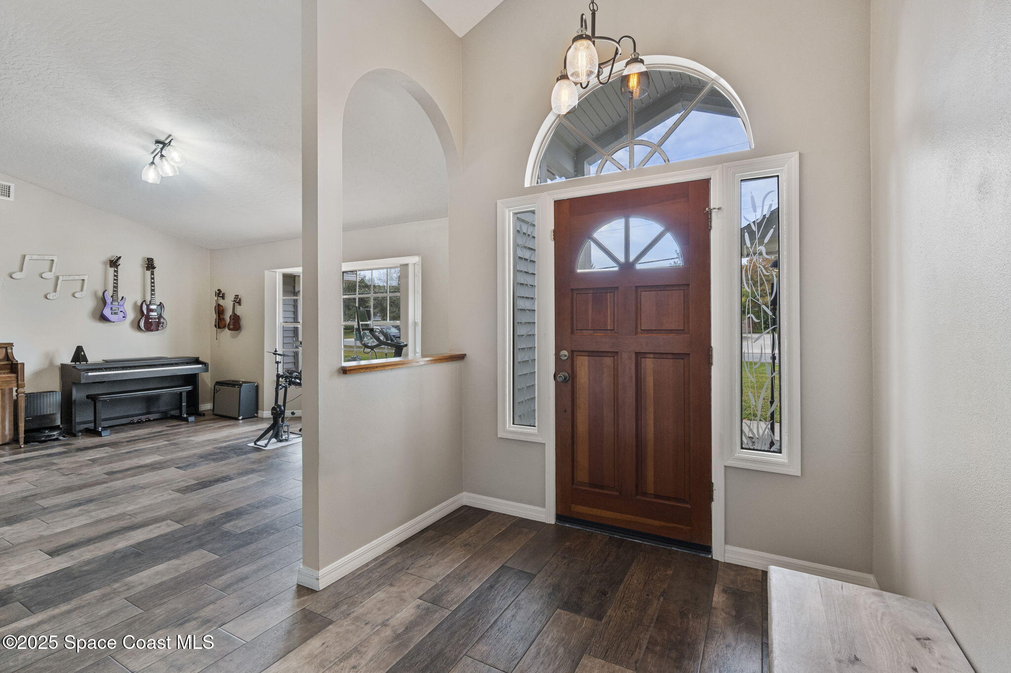 4089 Mallard Drive Melbourne, FL 32934 - Photo 5 of 53 a view of livingroom with furniture and wooden floor