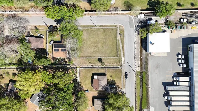 an aerial view of a house with a outdoor space