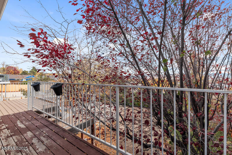 2990 Scottsdale Road Reno, NV 89512 - Photo 4 of 18 a view of a chairs and table on the wooden floor
