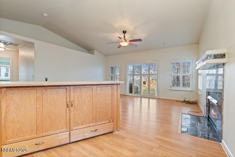 2990 Scottsdale Road Reno, NV 89512 - Photo 9 of 18 a view of an empty room with window and wooden floor