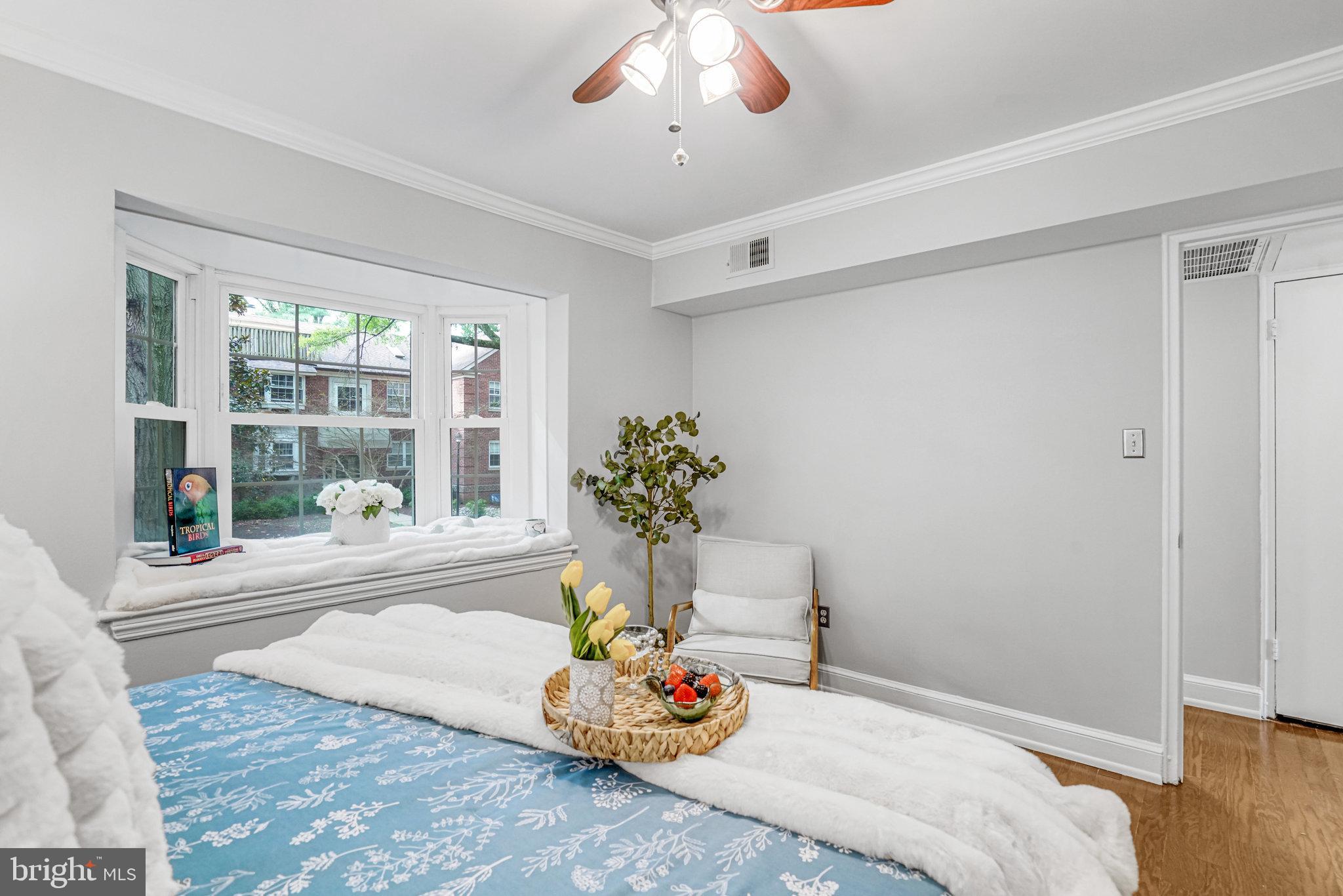 2106 North Scott Street, Unit 40 Arlington, VA 22209 - Photo 7 of 34 a living room with furniture and window