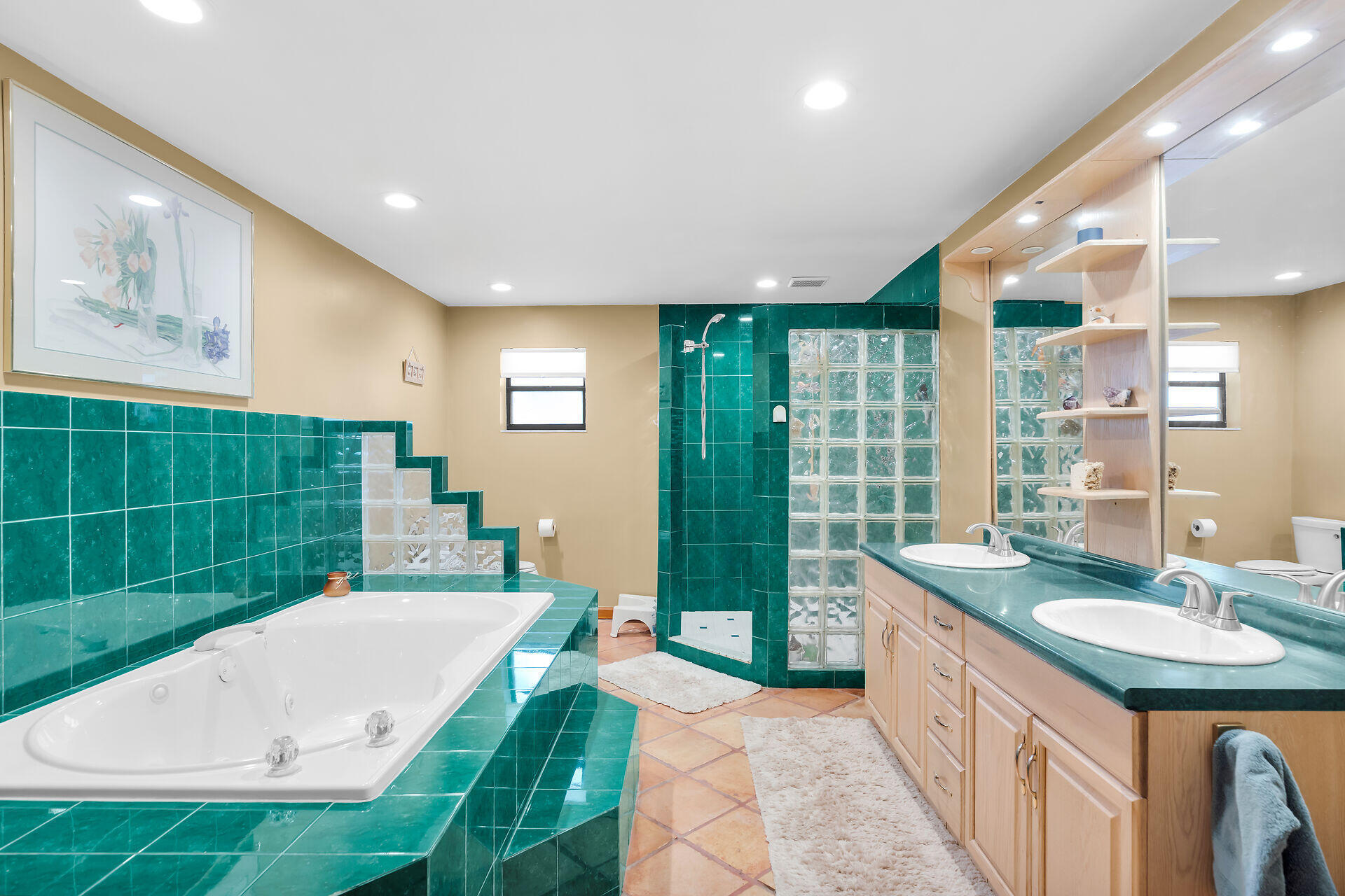 323 Bayview Avenue Key Largo, FL 33037 - Photo 13 of 46 a bathroom with a tub sink and mirror